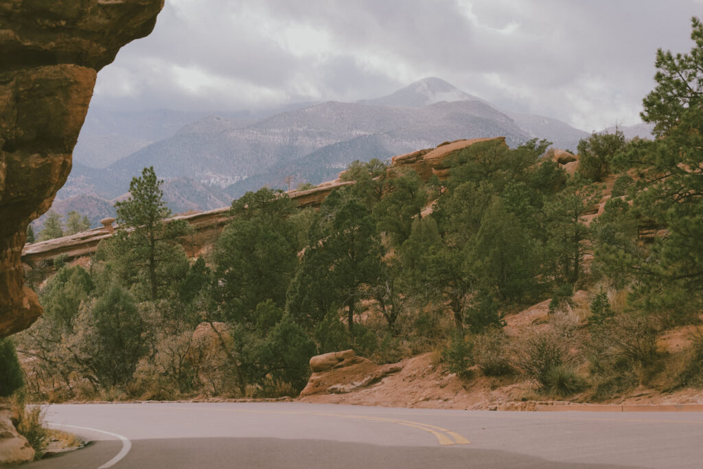 Garden of the Gods Mountain Views - Views of Pikes Peak in the background with Green forest in front